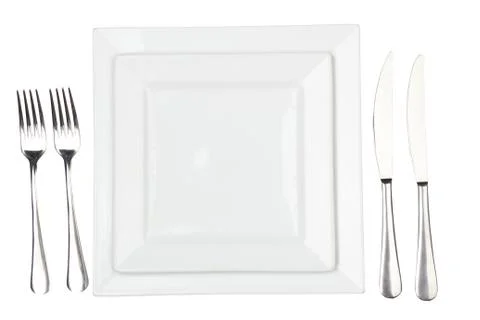 Place setting with high-gloss plate, knife &amp; fork. Stock-Fotos
