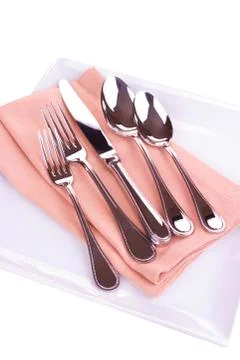 Place setting on napkin Stock Photos