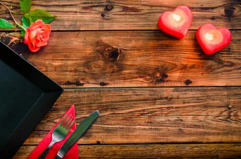 Place setting on rustic wooden table Stock Photos
