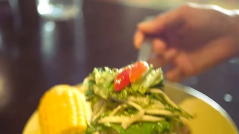 Place the vegetable salad with herbs on the corn plate. 1920x1080. full hd Stock Footage 136255243