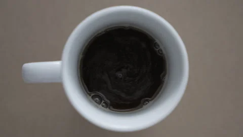 Place A White Cup Of Coffee On A Table. Aromatic Coffee Stock Footage 266801003