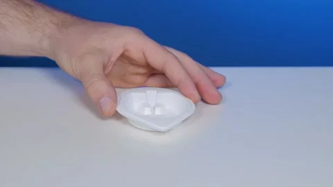 Place white plastic urine cup for sample collection for home-testing Stock Footage 240840591
