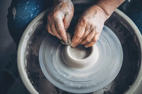 Place to work. Top view potter making ceramic pot on the pottery wheel Stock Photos
