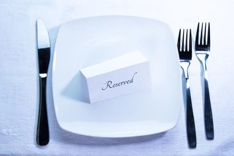 Placed at a reserved table seen from above Stock Photos