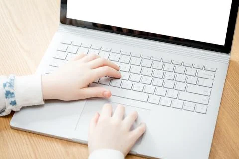 Placeit - Child Uses a Computer for School Work Foto stock