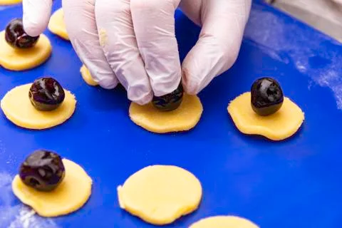 Placing Amarena Cherry Stock Photos