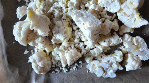 Placing and Preparing Fresh Cauliflower Florets on Baking Sheet - Food Prep.. Stock Footage 327392222
