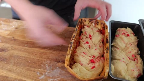 Placing Braided Praline Dough Into Mold 스톡 동영상 328578578