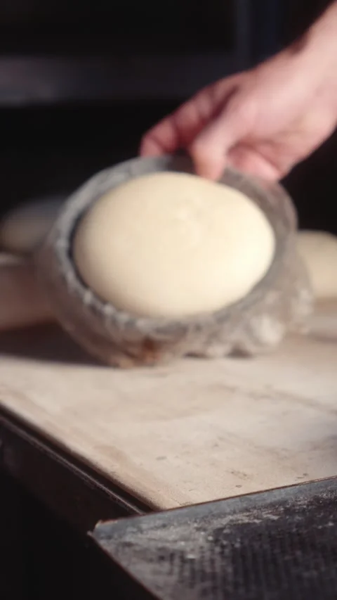 Placing Bread Dough on Baking Board for Baking Stock Footage 344313228