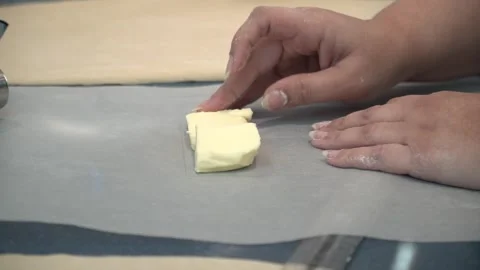 Placing Butter for Baking Stock Footage 317472580