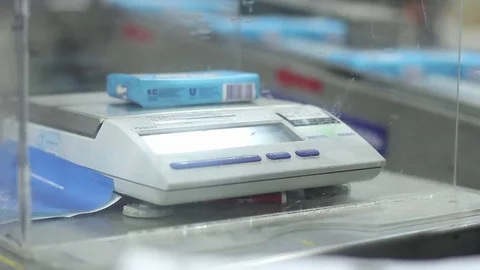 Placing butter stick on scale Stock Footage 77053553