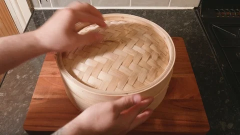 Placing cabbage in a steaming basket Stock Footage 119189799