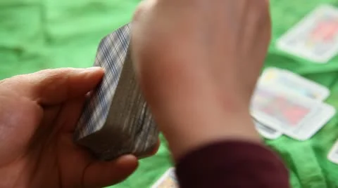 Placing Cards Back in Deck Stock Footage 21280909