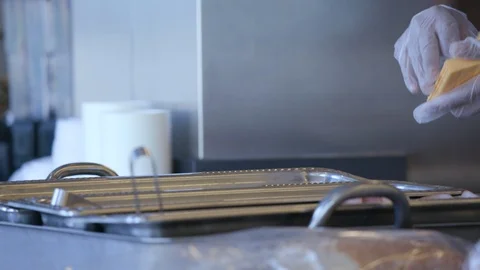 Placing cheese into a pan Video stock 103883577