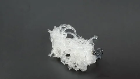 Placing Clean Processed Bird Nest Strands On Black Plate Stock Footage 339368254
