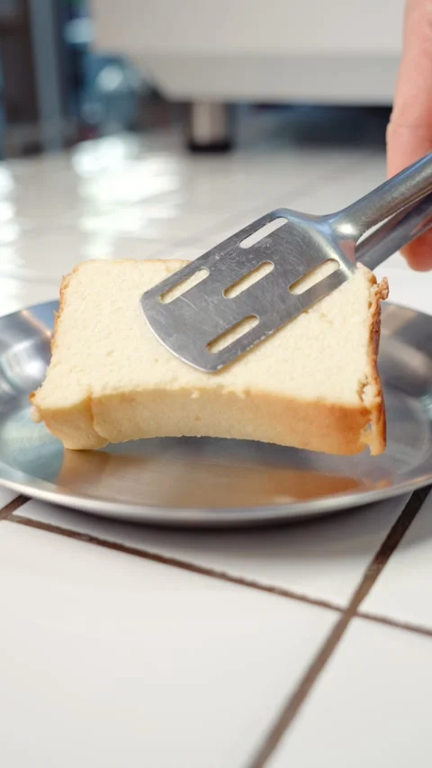 Placing Cottage Cheese Cake Slice on Metal Plate Stock Footage 342924345
