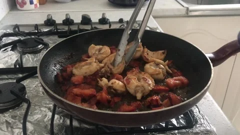 Placing Cuttlefishes From Pan To A Plate Stock Footage 130916072