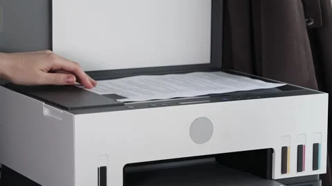 Placing document on scanner glass of modern multifunction printer, showing .. 動画素材 304806666