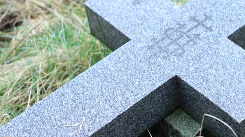 Placing on gravestone Stock Footage 40678728