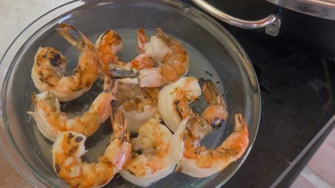 Placing Grilled Shrimp onto a Platter in 4k Stock Footage 99068778