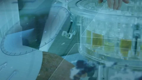 Placing hand on lid, scientist in lab rotating it lifting test tube with Stock Footage 317740335