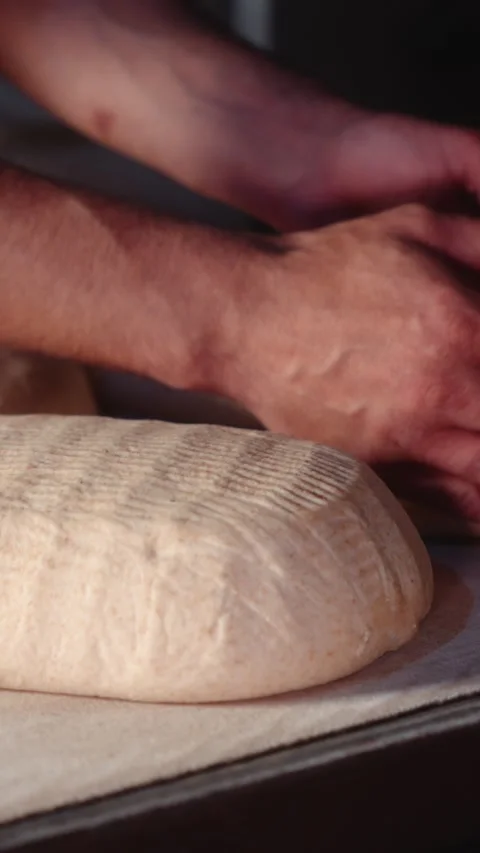 Placing Large Bread Dough on a Baking Board Video stock 344313205