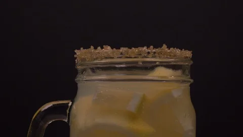 Placing Lemon Slice on Jar with Sugar Coating 4K Video stock 131113245