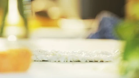 Placing Lettuce on Rice Seen From the Side Stock Footage 71074135
