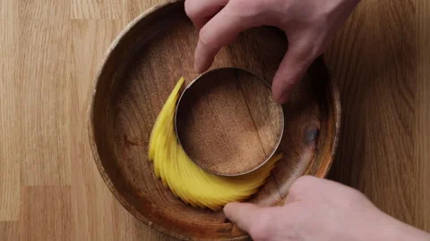 Placing Mango Slices On Plate Top View 스톡 동영상 335407015