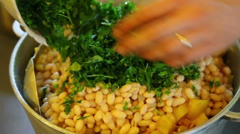 Placing parsley over beans Stock Footage 40889537