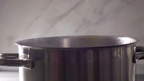 Placing a pasta in boiling water Video stock 103859490