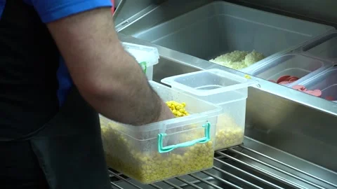 Placing pizza ingredients Stock Footage 187167492