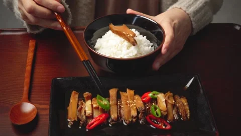 Placing Side Dish on Steamed Rice with Chopsticks Close Up 4K Stock Footage 334832860