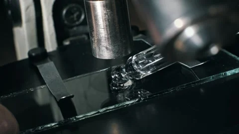 Placing Slide and Adding Liquid Sample to Microscope Stock Footage 320576124