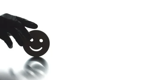 Placing smiley icon and FUN text on white background Stock Footage 142017716