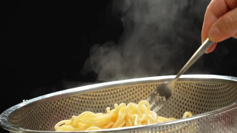 Placing Steaming Cooked Spaghetti in Colander Video stock 345601392