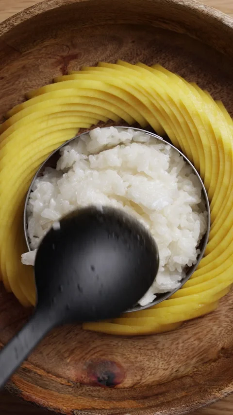 Placing Sticky Rice Into Plate  Vertical Top View Extreme Close Up 스톡 동영상 335774625