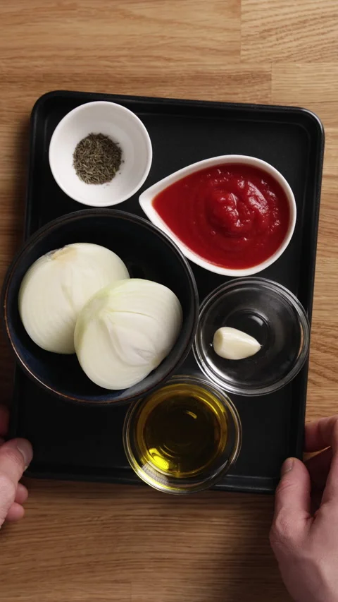 Placing Tomato Sauce Ingredients on Table Top View Stock-Footage 329888747