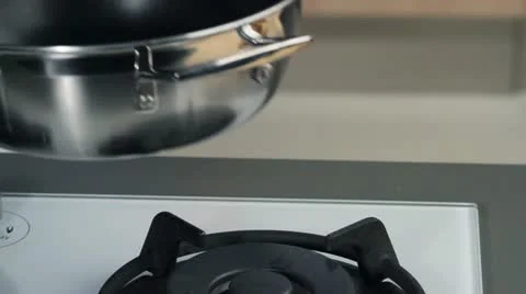 Placing unpeeled potatoes in a pan Video stock 24671365
