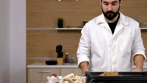 Placing vegetables on a grill Stock Footage 85364410