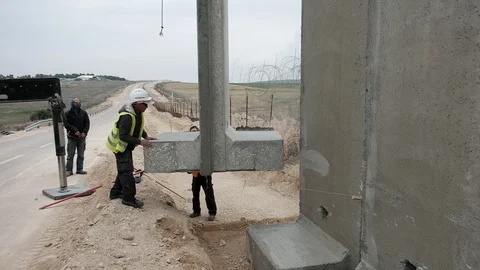 Placing the wall segment Stock Footage 109220251
