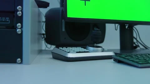 Placing a white mug on a desk after sip in front of a green screen Stock Footage 277577256