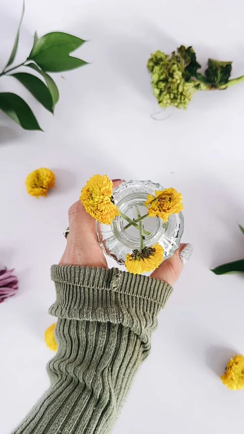 Placing yellow flowers, flowers on table, plant and flower arrangements, Stock Footage 304712972