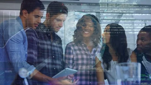 Plaid man showing tablet in tech meeting, team leaning, reviewing work with Stock Footage 331214597