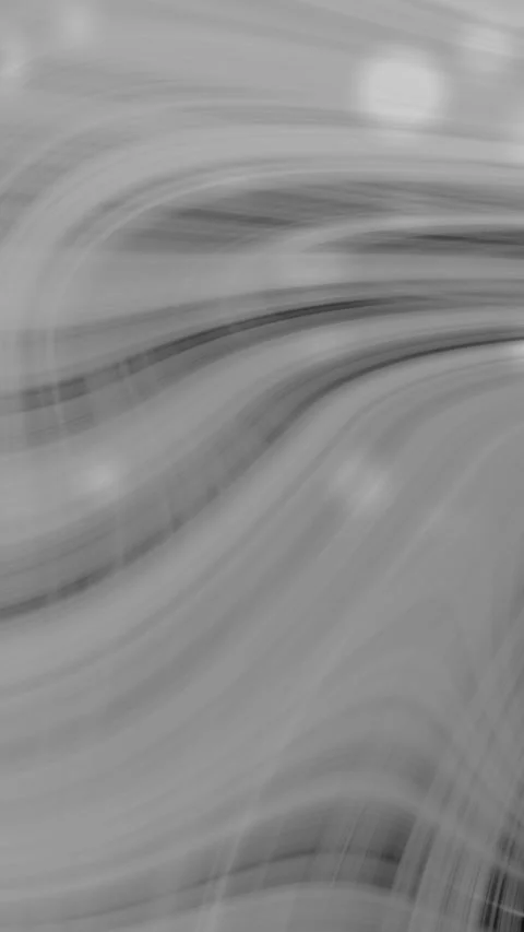 Plain black background enhances abstract gray and white image with blurred curvi Stock Footage 327542094