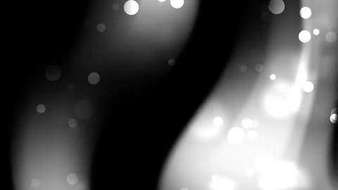 Plain black background subtly blurred with white lights creating a dreamy effect Stock Footage 312124232