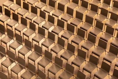 Plain chairs arranging in pattern of line and row Stock Photos