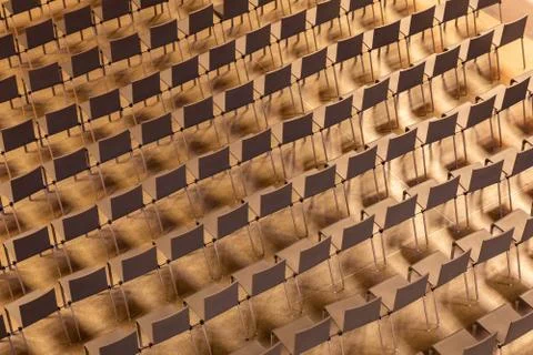 Plain chairs arranging in pattern of line and row Stock Photos