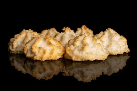 Plain coconut biscuit isolated on black glass Stock Photos