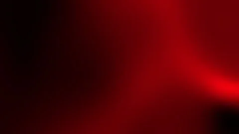 Plain color background highlights a gradient of red and black colors blurring to Stock Footage 313506943